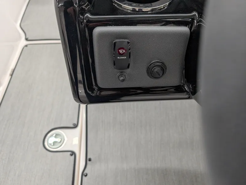 Slide: The Image of 2024 Yamaha Boats AR195 dashboard switch panel with blower control. - 7