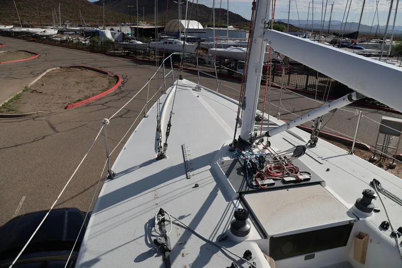 Slide: The Image of Catalina Capri 37 sailboat deck view, 1992 model, in a marina setting. - 14