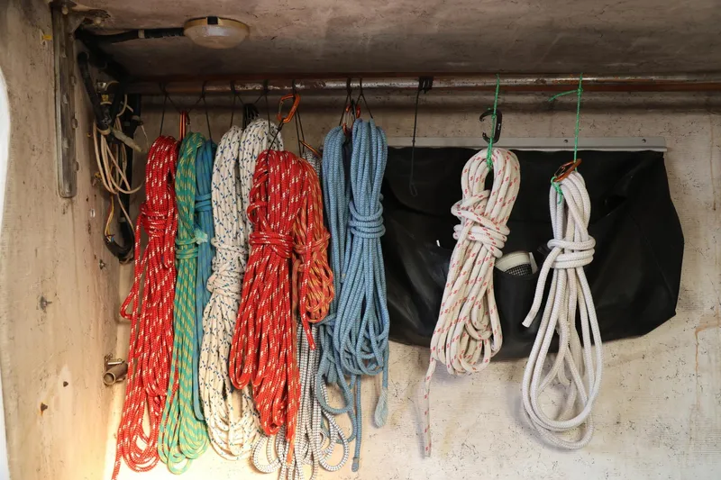 Slide: The Image of Colorful ropes hanging in a Catalina Capri 37 sailboat, 1992 model. - 8