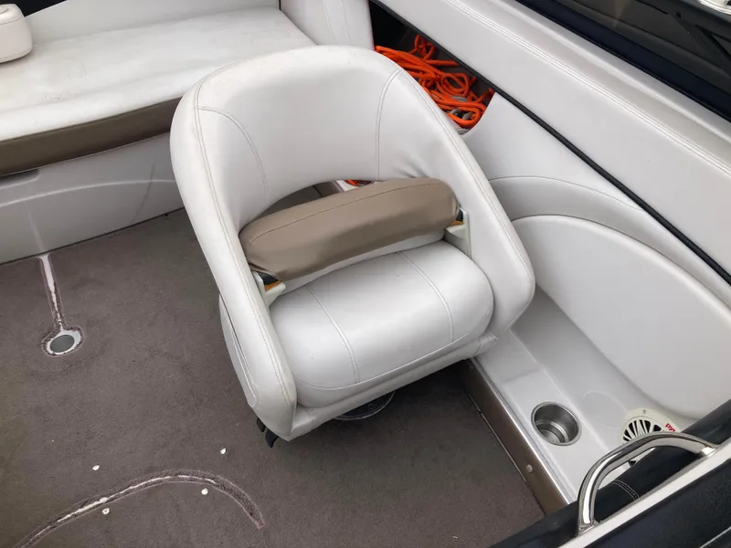 Slide: The Image of 2008 Four Winns H200 boat interior with white seating and orange rope. - 10