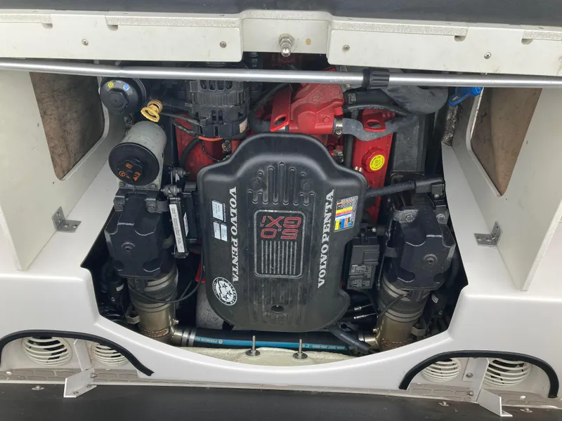 Slide: The Image of Volvo Penta engine in a 2008 Four Winns H200 boat, showcasing detailed components. - 12