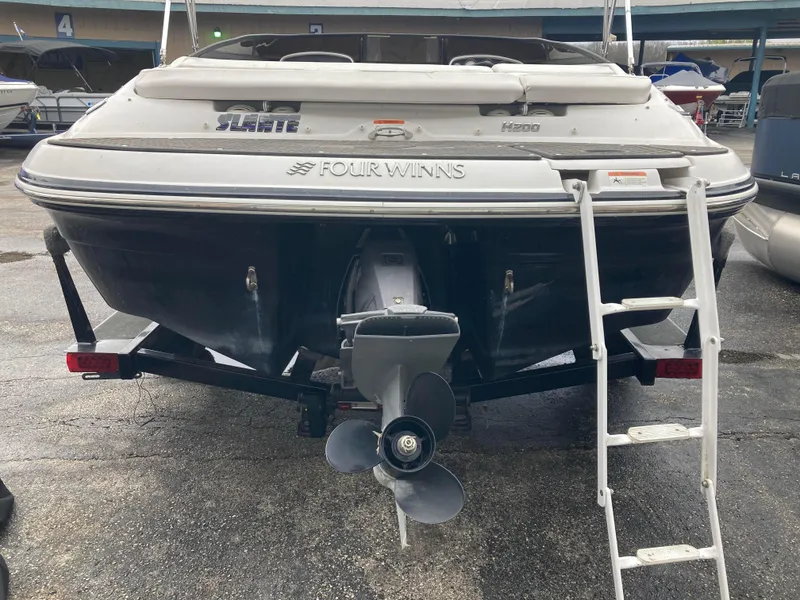 Slide: The Image of 2008 Four Winns H200 boat rear view with ladder and propeller. - 3