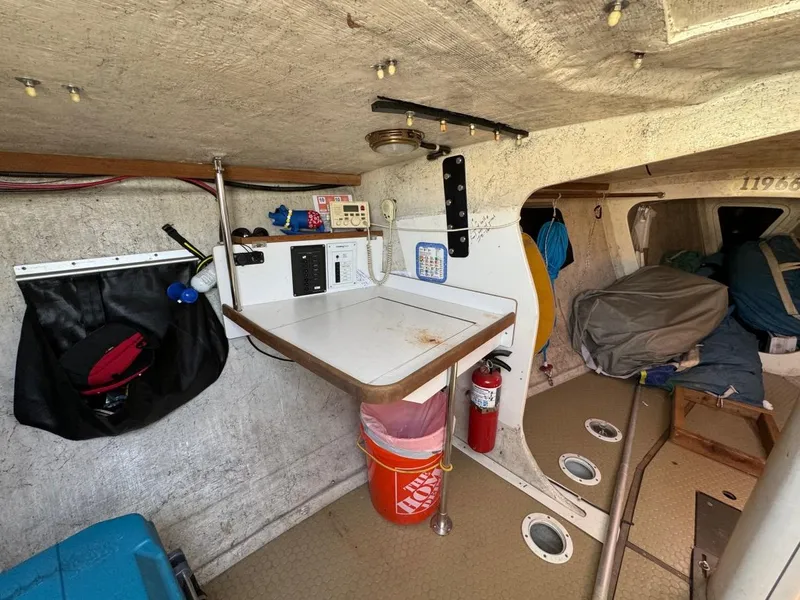 Slide: The Image of Interior of a 1992 Catalina Capri 37 sailboat with navigation station and equipment. - 28