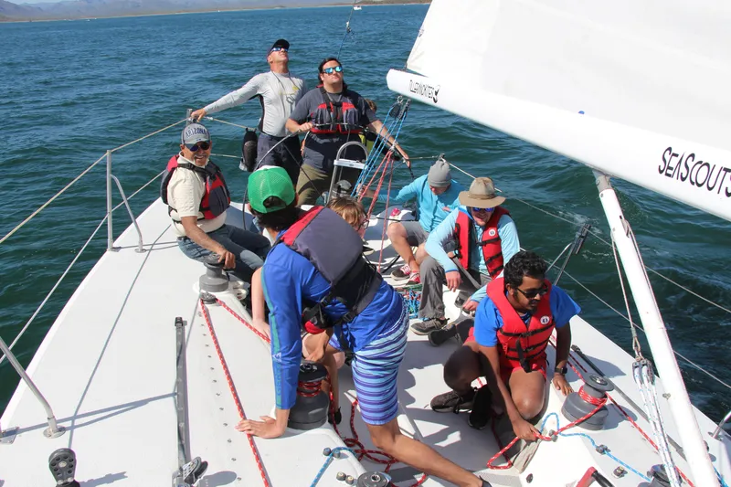 Slide: The Image of Group sailing on a 1992 Catalina Capri 37, enjoying a sunny day on the water. - 7