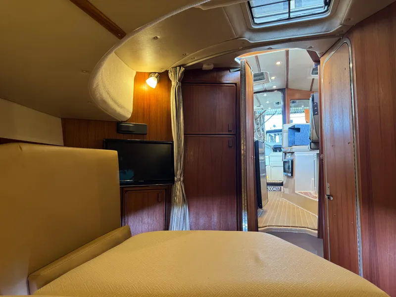 Slide: The Image of 2020 Ranger Tugs R-31 S interior cabin with cozy seating and modern amenities. - 27