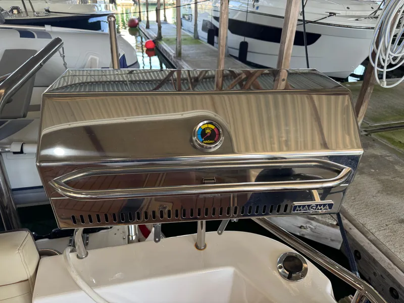 Slide: The Image of Stainless steel Magma grill on 2020 Ranger Tugs R-31 S boat, docked in marina. - 38
