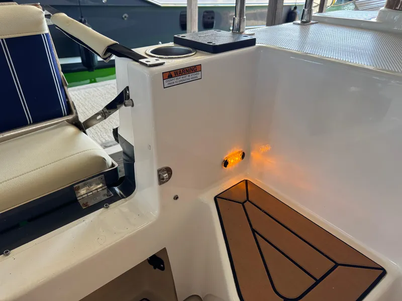 Slide: The Image of 2020 Ranger Tugs R-31 S boat interior with seating and illuminated step area. - 40