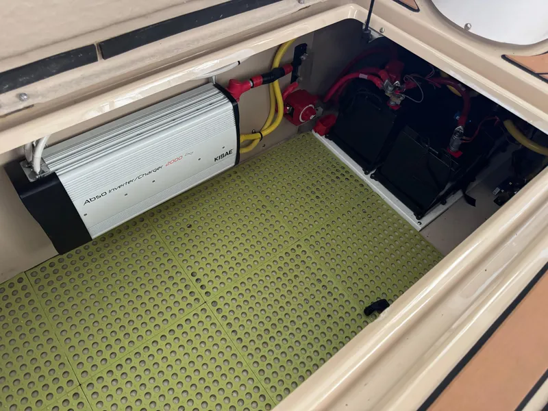 Slide: The Image of 2020 Ranger Tugs R-31 S engine compartment with battery and inverter system. - 42