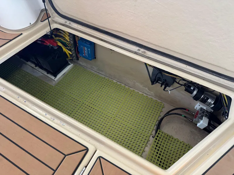 Slide: The Image of 2020 Ranger Tugs R-31 S engine compartment with wiring and equipment. - 43