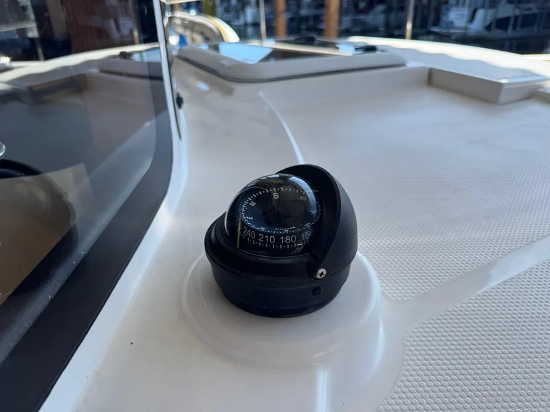 Slide: The Image of Compass on 2020 Ranger Tugs R-31 S boat deck, close-up view. - 47