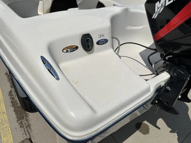 Slide: The Image of Bayliner 160 Capri 2002 boat stern with motor and control panel. - 20