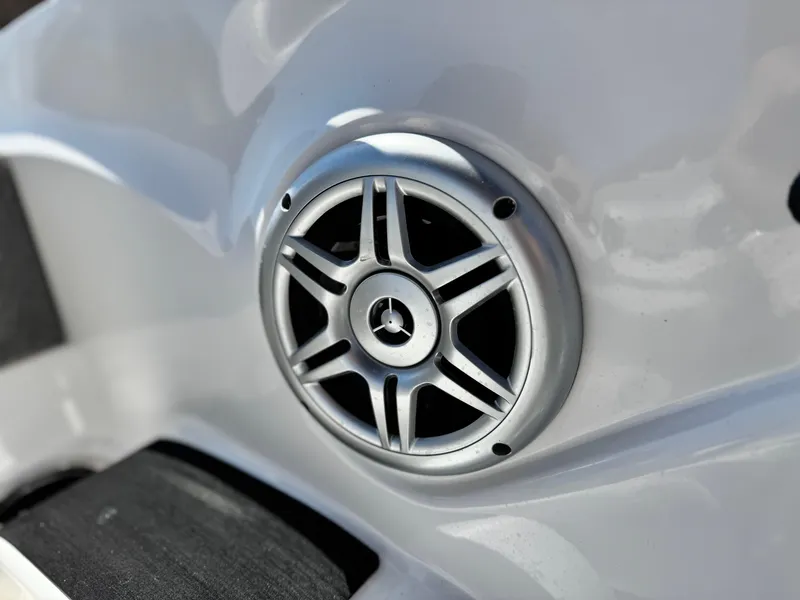 Slide: The Image of 2021 Nitro Z19 Sport boat speaker detail, featuring sleek silver design. - 21