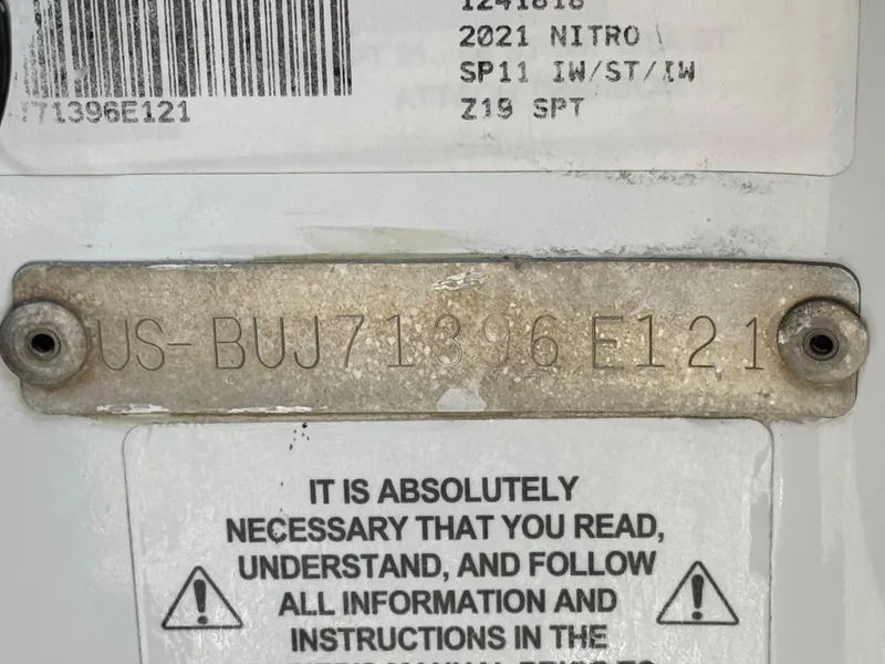 Slide: The Image of 2021 Nitro Z19 Sport identification plate with serial number and safety instructions. - 30