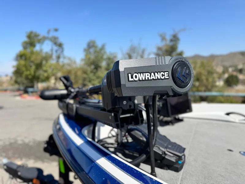 Slide: The Image of Lowrance equipment on 2021 Nitro Z19 Sport boat, outdoors with blurred trees in background. - 4