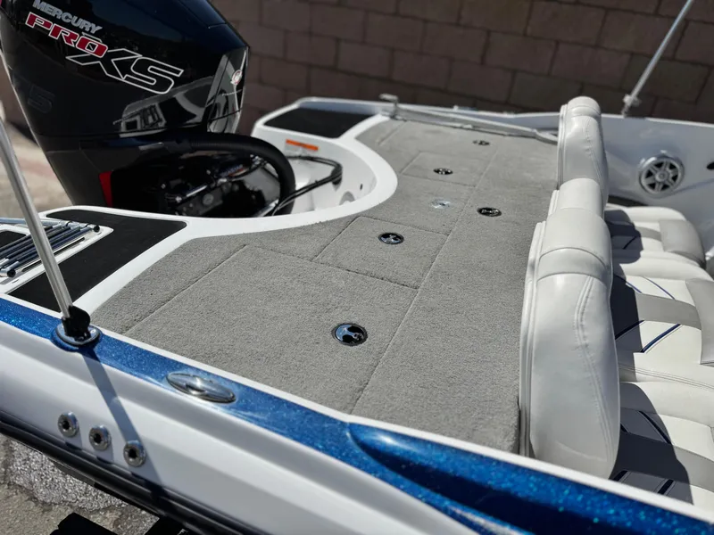 Slide: The Image of 2021 Nitro Z19 Sport boat with Mercury Pro XS engine, featuring spacious seating and deck. - 8