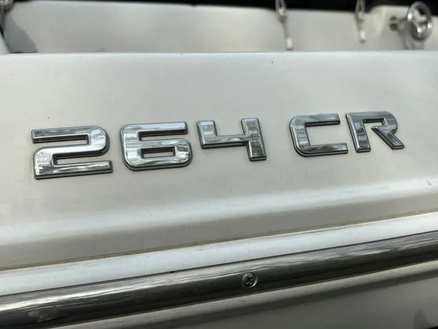 Slide: The Image of Crownline 264 CR 2022 model emblem on a white surface. - 4