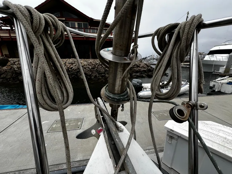 Slide: The Image of Ropes and rigging on a 1974 Irwin 37 Center Cockpit sailboat at a marina dock. - 11