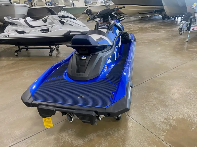 Slide: The Image of 2024 Yamaha Boats VX1900B-AB jet ski in showroom, featuring sleek blue design. - 3