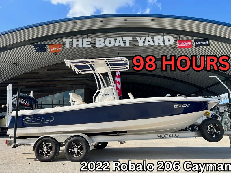 Slide: The Image of 2022 Robalo 206 Cayman boat on trailer at The Boat Yard, 98 hours used. - 1