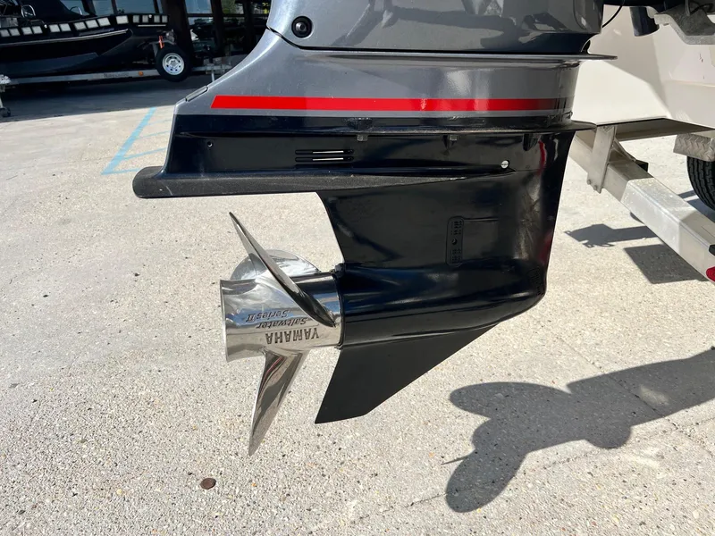 Slide: The Image of Propeller of a 2022 Robalo 206 Cayman with Yamaha engine, parked on concrete. - 5