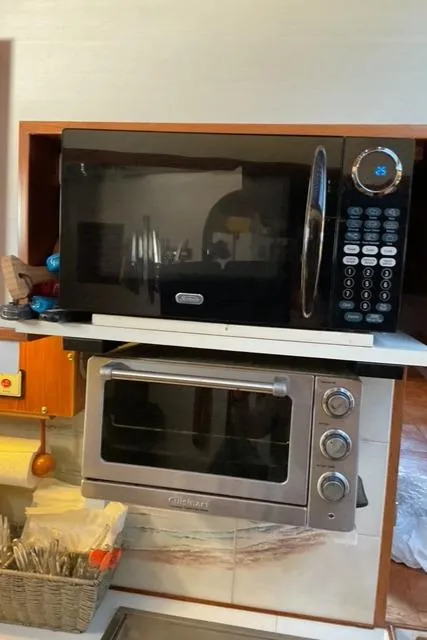 Slide: The Image of Microwave and toaster oven in 1988 Jefferson 42 Sundeck kitchen. - 48