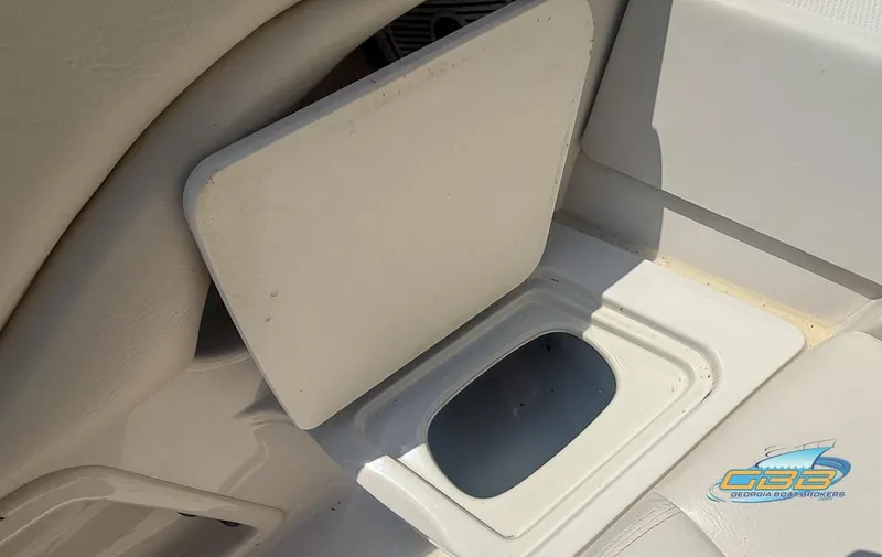 Slide: The Image of 2007 Tahoe Q7i SF boat interior storage compartment with open lid. - 31