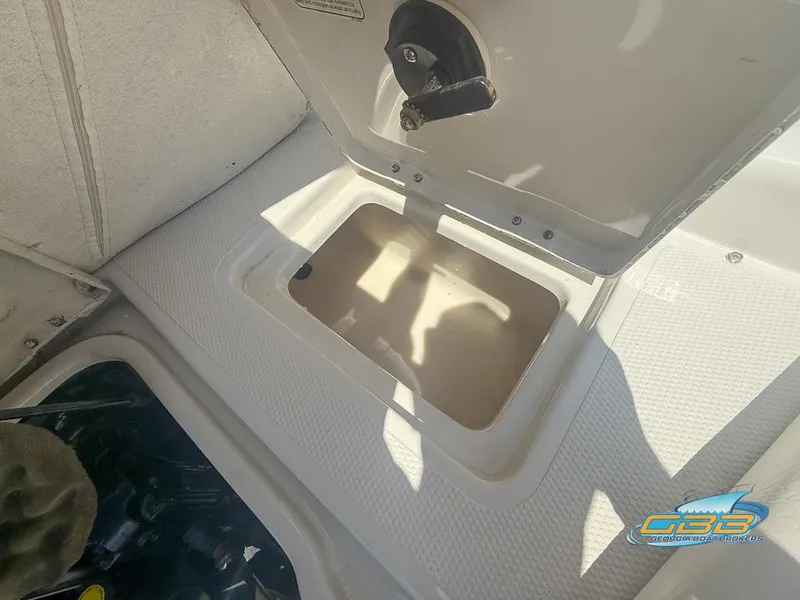 Slide: The Image of 2007 Tahoe Q7i SF boat storage compartment with open hatch. - 32