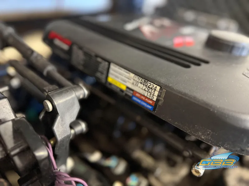 Slide: The Image of Close-up of a 2007 Tahoe Q7i SF engine with visible labels and components. - 33