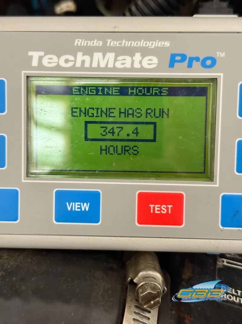 Slide: The Image of Digital display showing engine hours: 347.4 on a 2007 Tahoe Q7i SF. - 36