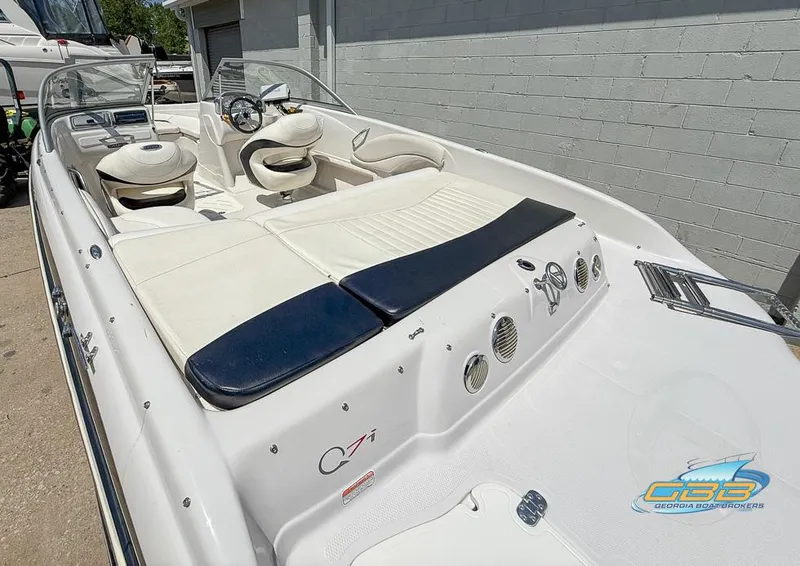 Slide: The Image of 2007 Tahoe Q7i SF boat with white interior and sleek design. - 5