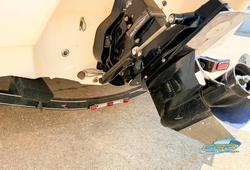 Slide: The Image of 2007 Tahoe Q7i SF boat motor and propeller close-up on concrete surface. - 7