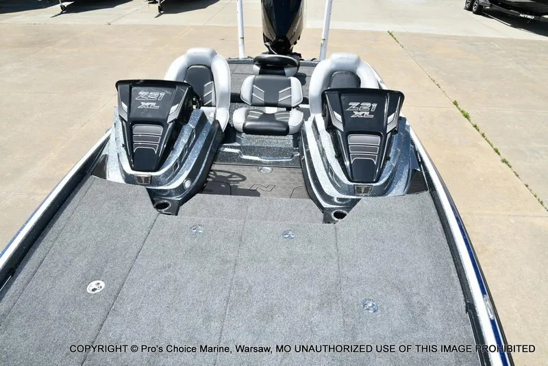 Slide: The Image of 2024 Nitro Z21 XL Pro boat with dual seats and spacious deck. - 11