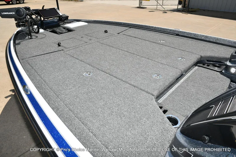Slide: The Image of 2024 Nitro Z21 XL Pro boat deck with Lowrance equipment, featuring spacious gray carpeting. - 13