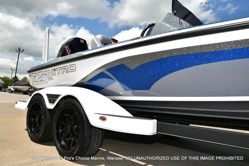 Slide: The Image of 2024 Nitro Z21 XL Pro boat with sleek design and vibrant blue accents. - 17