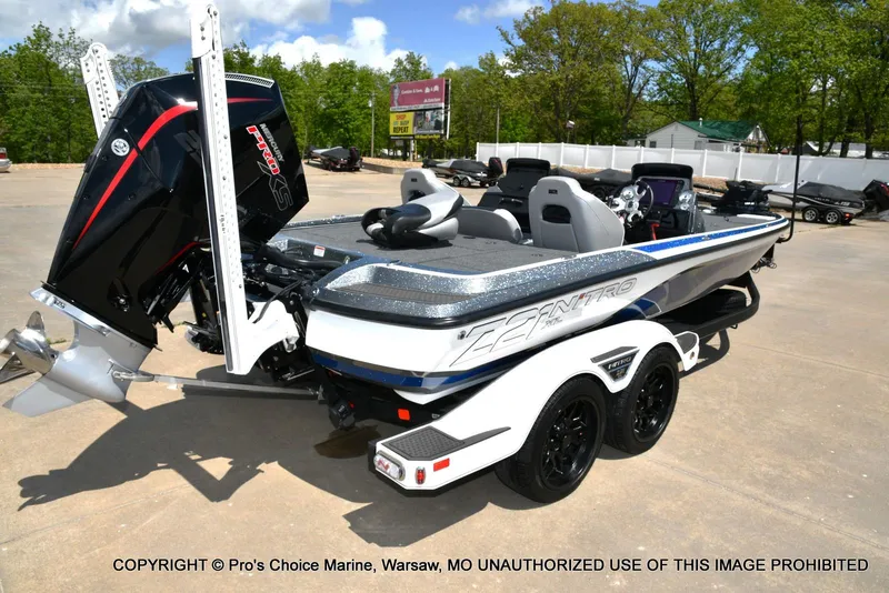 Slide: The Image of 2024 Nitro Z21 XL Pro boat with powerful engine, parked outdoors on a sunny day. - 18