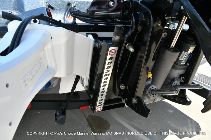 Slide: The Image of 2024 Nitro Z21 XL Pro boat engine components and hydraulic system close-up. - 22