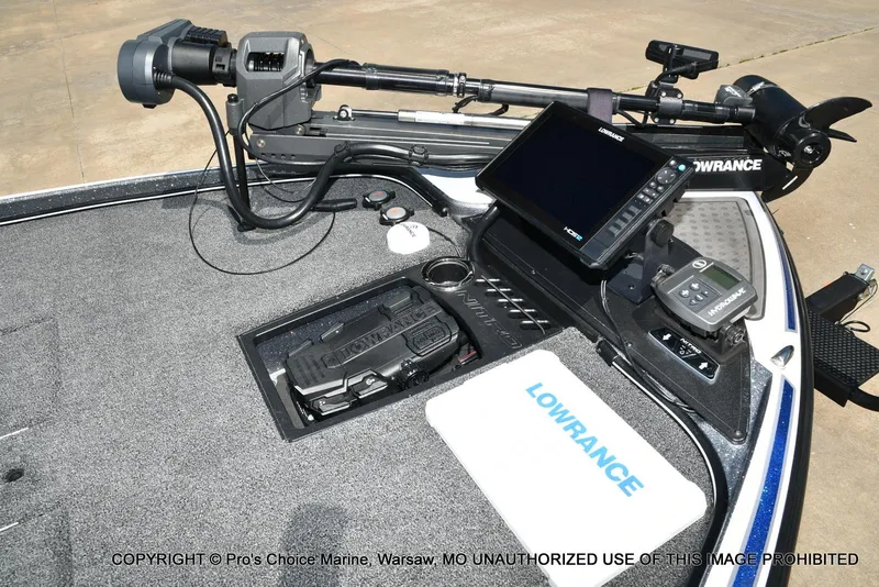 Slide: The Image of 2024 Nitro Z21 XL Pro boat deck with Lowrance electronics and trolling motor. - 3