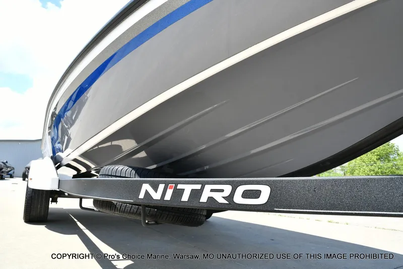 Slide: The Image of 2024 Nitro Z21 XL Pro boat on trailer, close-up view. - 33