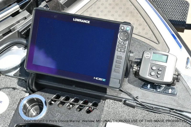 Slide: The Image of 2024 Nitro Z21 XL Pro boat dashboard with Lowrance HDS12 display and control panel. - 4