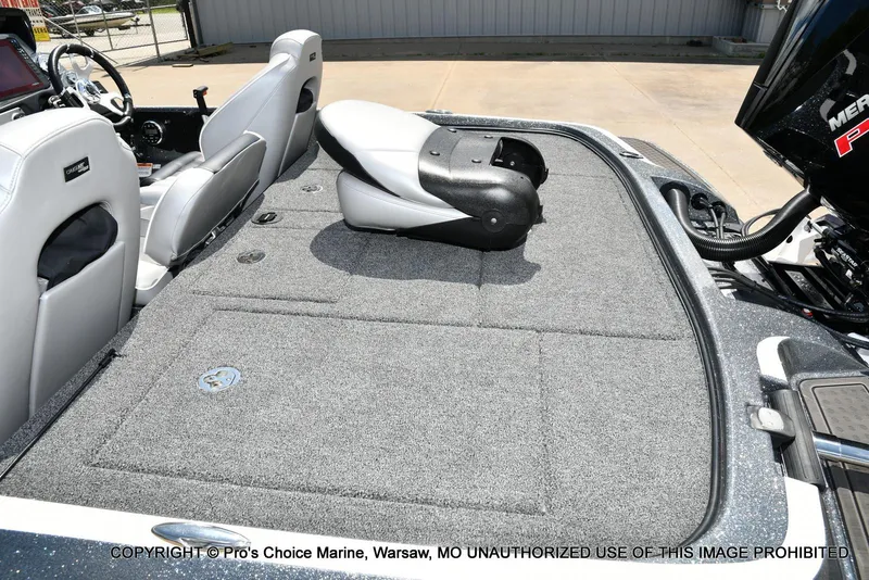 Slide: The Image of 2024 Nitro Z21 XL Pro boat interior with gray carpet and seating. - 41