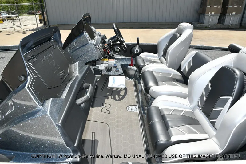 Slide: The Image of 2024 Nitro Z21 XL Pro boat interior with sleek seating and modern dashboard design. - 42