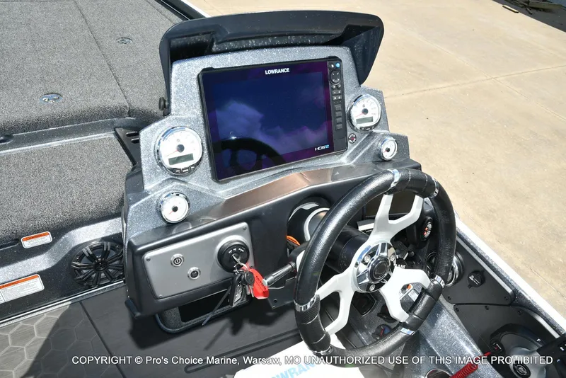 Slide: The Image of 2024 Nitro Z21 XL Pro boat dashboard with steering wheel and digital display. - 45