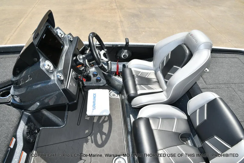 Slide: The Image of 2024 Nitro Z21 XL Pro boat interior with steering console and seating. - 46