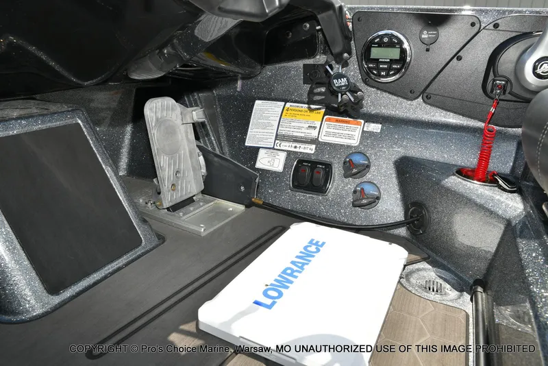 Slide: The Image of 2024 Nitro Z21 XL Pro boat dashboard with controls and Lowrance equipment. - 47