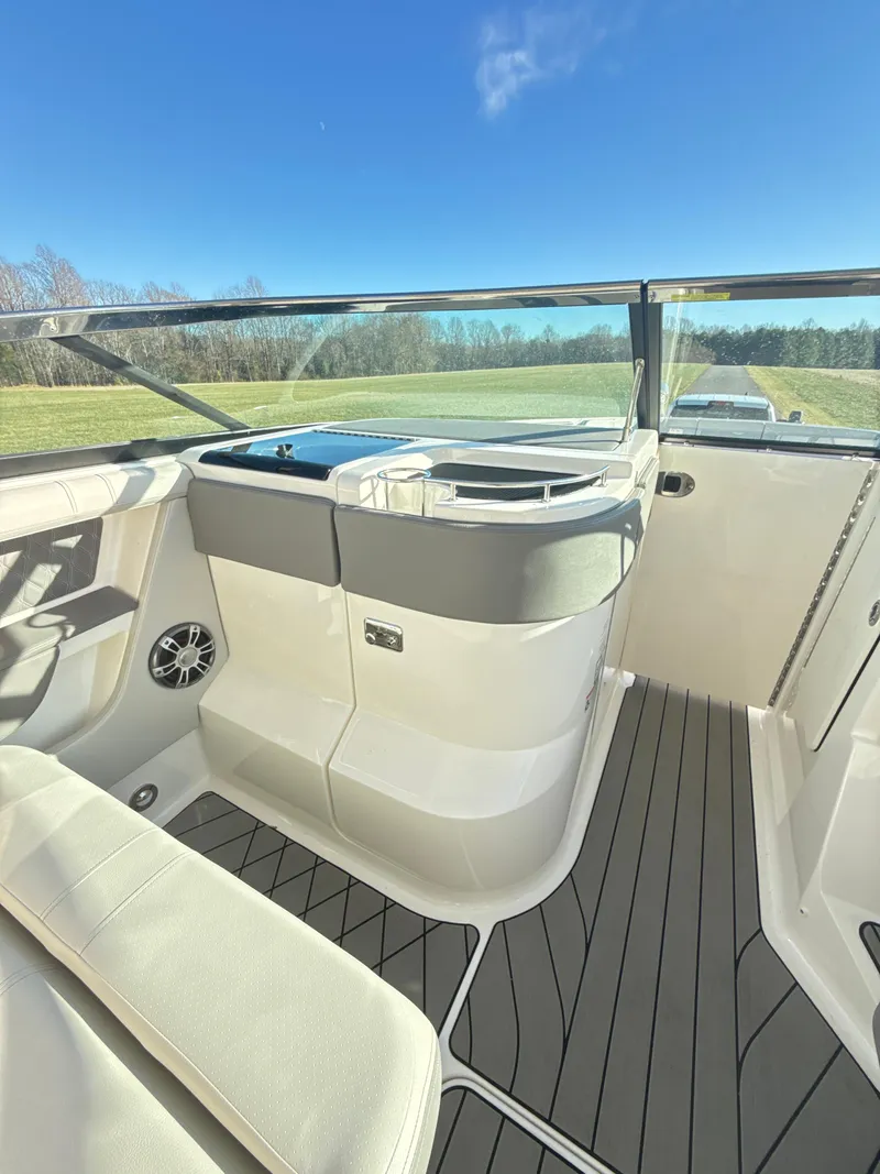Slide: The Image of 2023 Sea Ray SLX 310 OB boat interior with sleek design and modern features. - 18