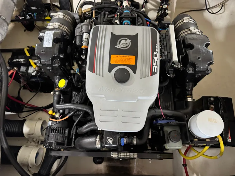 Slide: The Image of Engine of 2012 Chaparral 244 EXTREME boat, featuring a 350 MAG motor. - 13