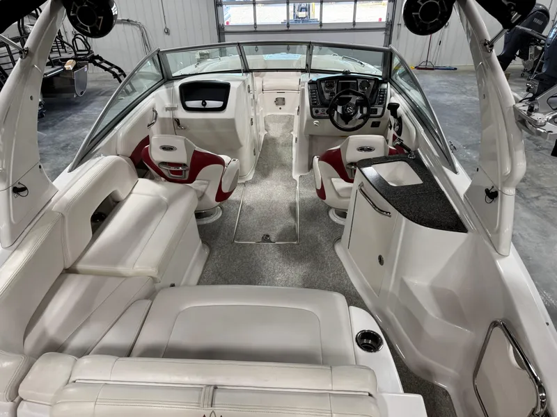 Slide: The Image of Interior of 2012 Chaparral 244 EXTREME boat with white seating and modern dashboard. - 6