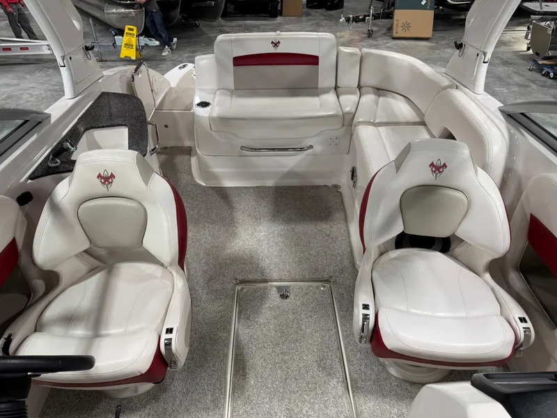 Slide: The Image of Interior of 2012 Chaparral 244 EXTREME boat with white and red seating. - 8