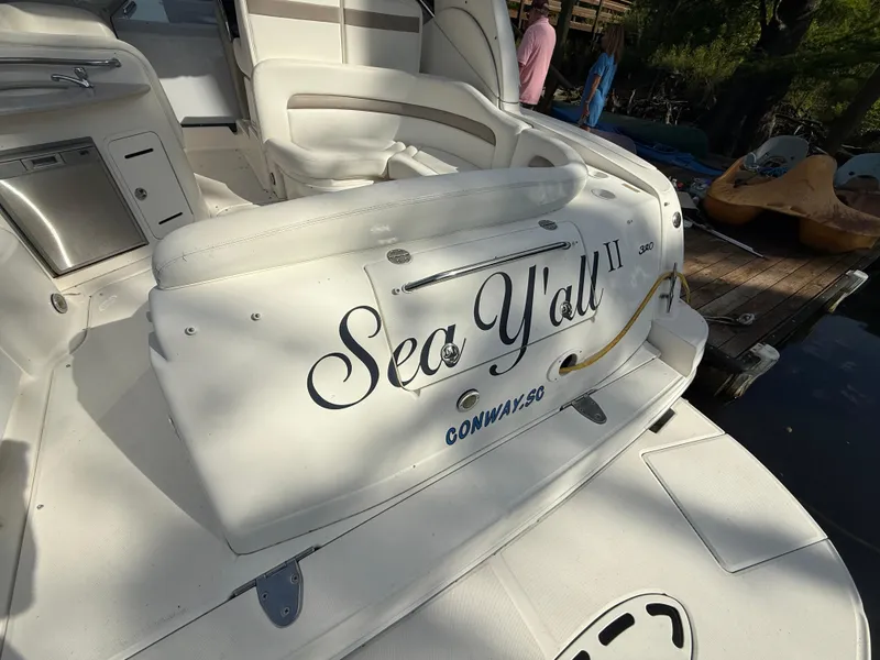 Slide: The Image of 2004 Sea Ray 320 Sundancer boat with "Sea Y'all" name, docked in Conway, SC. - 4