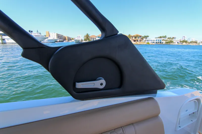 Slide: The Image of 2021 Sea Ray SDX 270 boat detail with scenic waterfront view. - 47